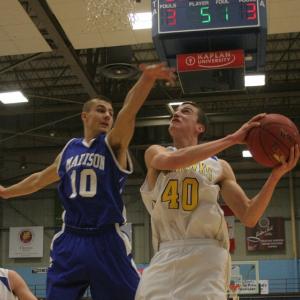 John Hepburn works hard to get off a shot against Dylan Price. Hepburn scored 20 points to lead Boothbay over Madison. KEVIN BURNHAM/Boothbay Register John Hepburn works hard to get off a shot against Dylan Price. Hepburn scored 20 points to lead Boothbay over Madison. KEVIN BURNHAM/Boothbay Register