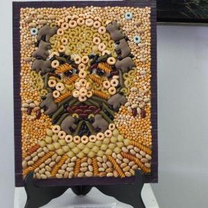 "Jim Taliana," a self portrait in pasta and crackers.