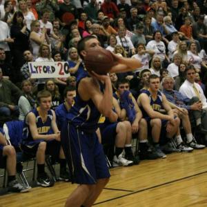 Andrew Hallinan gets ready to launch one of his two three-pointers in the fourth quarter. KEVIN BURNHAM/Boothbay Register