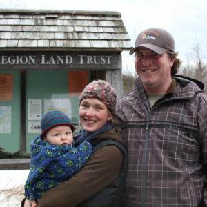 Maria Jenness, Travis Journagan and baby Roy at the Land Trust’s Penny Lake Preserve before an afternoon walk. SUE MELLO/Boothbay Register