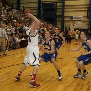 Andrew Hallinan, Anthony DiMauro and Nick Kilgus pressure Trevor Lyford in the fourth quarter. KEVIN BURNHAM/Boothbay Register