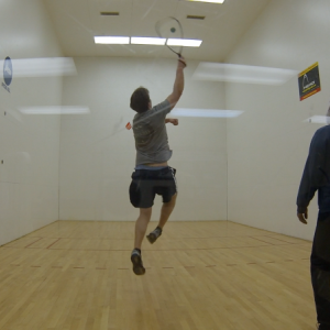 Ryan Leighton, a naïve staff reporter, plays Mike Lewis in a game of racquetball at the Boothbay Region YMCA.