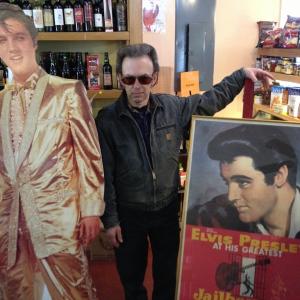 Earl Farr is ready to cut a rug as he stands with Elvis memorabilia for the '50s style “sock hop,” happening Saturday, March 2 at Coastal Maine Botanical Gardens. RYAN LEIGHTON/Boothbay Register