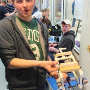 Dan Murray poses with his Seaperch robot. Murray and his partner Alex Owen placed second in the contest. RYAN LEIGHTON/Boothbay Register