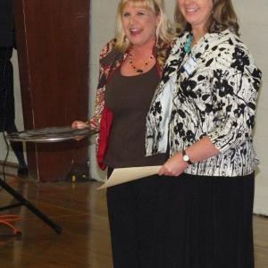  Ginny Bishop, left, receives the Character Development Award from presenter Anne Barker. RYAN LEIGHTON/Boothbay Register
