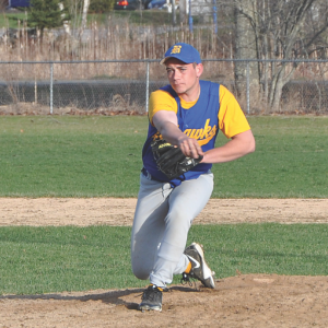 Jared Spofford delivers a pitch in the third inning. Spofford was called in out of the bullpen and promptly fanned a Carrabec batter. BEN BULKELEY/Boothbay Register