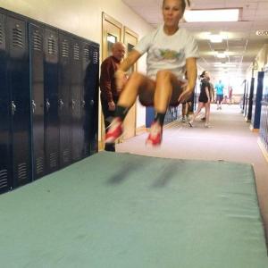 Morgan Crocker practices the long jump in the “all weather training facility” on the second floor of BRHS. RYAN LEIGHTON/Boothbay Register