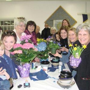 They may have been the last table up to the soup and salad tables, but they ranked first for the most raffle prizes. A whopping 14 were won – one for almost every woman at the table. LISA KRISTOFF/Boothbay Register