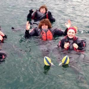 High School Sailing Club members brave the waters off Boothbay Harbor before their first practice of the spring. From left are, front: Madison Gaudette, Sarah Caron; middle: Nolan Conlin, Sherm Brewer, Sally Jarmusz; back: Liam Conlin and Jake Brewer. Courtesy of Andy Holmes