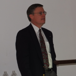 Moderator Carl "Chip" Griffin announces the election results. RYAN LEIGHTON/Boothbay Register