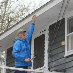 Ted Repa about to nail in a board on King Phillips Trail. SUE MELLO/Boothbay Register
