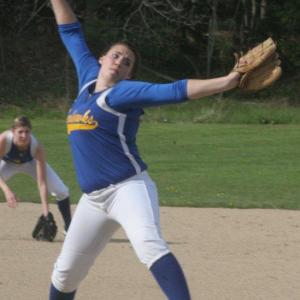 Allison Crocker gets ready to deliver a pitch in the first inning of Wednesday's home game against Lisbon. Below: Brenna Alley hauls in a fly ball in center field; Nicole Rice snares a throw from the catcher during Lisbon's Olivia Harrington's steal of third base during Wednesday's game. Shortstop Mikayla McFetridge is seen backing up the play. KEVIN BURNHAM/Boothbay Register Allison Crocker gets ready to deliver a pitch in the first inning of Wednesday's home game against Lisbon. KEVIN BURNHAM/Boothbay Register