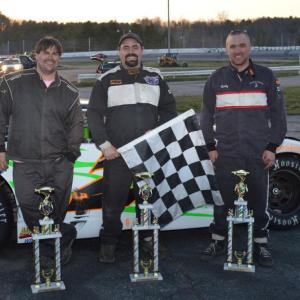Josh Bailey of Wiscasset, center, holding the checkered flag, celebrates his first career win in the Super Stock race on May 4 at the Wiscasset Speedway. Adam Chadbourn of Woolwich, left, took third and Bobby Mesimer of Wiscasset, right, took second place. Courtesy of Peter Taylor, Wiscasset Raceway Josh Bailey of Wiscasset, center, holding the checkered flag, celebrates his first career win in the Super Stock race on May 4 at the Wiscasset Speedway. Adam Chadbourn of Woolwich, left, took third and Bobby Mesimer of Wiscasset, right, took second place. Courtesy of Peter Taylor, Wiscasset Raceway
