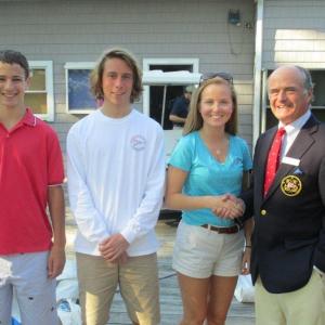 Officers of the Boothbay Harbor Yacht Club's Junior Yacht Club are congratulated by BHYC Commodore Neil Newton, right. From left are Aidan Clark, Dungan Milhouse and Catherine Clark. Courtesy of Andy Holmes Officers of the Boothbay Harbor Yacht Club's Junior Yacht Club are congratulated by BHYC Commodore Neil Newton, right. From left are Aidan Clark, Dungan Milhouse and Catherine Clark. Courtesy of Andy Holmes