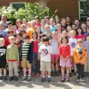The 2012-2013 student body and teachers of the Center for Teaching and Learning. The group photo imitates the first photo taken in 1990 when the school first opened. Founder, teacher and chairman of the board Nancie Atwell, on left, second row, is retiring at the end of this school year. LISA KRISTOFF/Boothbay Register