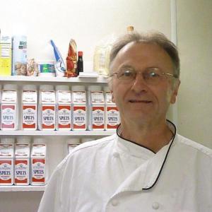 John Reed stands by “his” spice rack in the Fisherman’s Wharf kitchen where he creates the sauces on the menu. KATRINA CLARK/Boothbay Register John Reed stands by “his” spice rack in the Fisherman’s Wharf kitchen where he creates the sauces on the menu. KATRINA CLARK/Boothbay Register