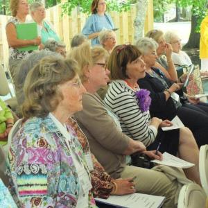 Boothbay Region Garden Club members absorbing the display technique known as “transparencies.” LISA KRISTOFF/Boothbay Register