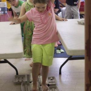 Gracie Greene completes the egg walk successfully. Courtesy of Seeds of Knowledge Education Center