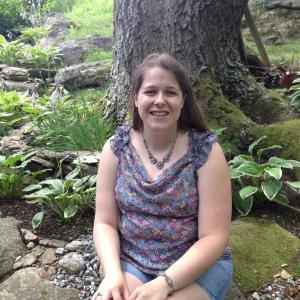 Sarah Duggan in one of her favorite not-so-secret garden spots behind her home in Boothbay Harbor. LISA KRISTOFF/Boothbay Register