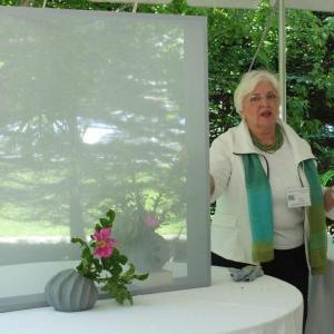 Sandra Leonard, seasonally of Southport, demonstrates the "transparencies"display technique. LISA KRISTOFF/Boothbay Register Sandra Leonard, seasonally of Southport, demonstrates the "transparencies" technique. LISA KRISTOFF/Boothbay Register