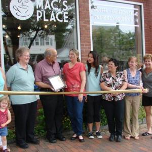 Taking part in a ribbon-cutting on July 1 at Mac's Place are, from left, Wiscasset Selectmen's Vice Chairman Judy Colby with granddaughter Dezirae Colby, Le Garage owner and Wiscasset Area Chamber of Commerce board member Cheryl Rust, Selectmen's Chairman Ed Polewarczyk, Mac's Place owner Karen McDorr, McDorr's daughter Danielle Sylvain, Selectman Pam Dunning, Town Planner Misty Parker and chamber board member Michelle Peele. SUSAN JOHNS/Wiscasset Newspaper Taking part in a ribbon-cutting on July 1 at Mac's Place are, from left, Wiscasset Selectmen's Vice Chairman Judy Colby with granddaughter Dezirae Colby, Le Garage owner and Wiscasset Area Chamber of Commerce board member Cheryl Rust, Selectmen's Chairman Ed Polewarczyk, Mac's Place owner Karen McDorr, McDorr's daughter Danielle Sylvain, Selectman Pam Dunning, Town Planner Misty Parker and chamber board member Michelle Peele. SUSAN JOHNS/Wiscasset Newspaper