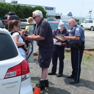 Elizabeth Medina is relieved her two-week-old daughter Sophie is OK after being locked inside a car for 15 minutes. Boothbay Harbor Police Officer Richard Mirabile and paramedics from Boothbay Region Ambulance Service responded to the scene. RYAN LEIGHTON/Boothbay Register