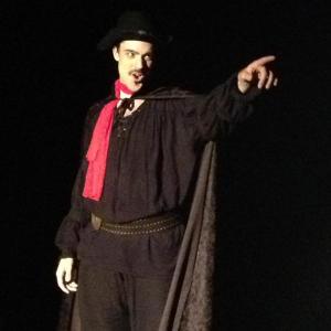 Nicholas Carroll as El Gallo.
