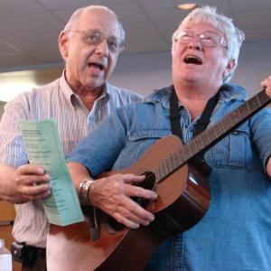 Wiscasset Selectmen's Chairman Ed Polewarczyk, left, and Donna Waterman lead a sing-along. SUSAN JOHNS/Wiscasset Newspaper