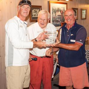 Ken Colburn, left, winner of the Division One series in the Boothbay Harbor Yacht Club Regatta sailing his Swan 42, Apparition. Colburn is being congratulated by
BHYC Commodore Neil Newton (right) and PC Andy Holmes, Regatta chair. Courtesy of Don Snyder Ken Colburn, left, winner of the Division One series in the Boothbay Harbor Yacht Club Regatta sailing his Swan 42, Apparition. Colburn is being congratulated by BHYC Commodore Neil Newton (right) and PC Andy Holmes, Regatta chair. Courtesy of Don Snyder
