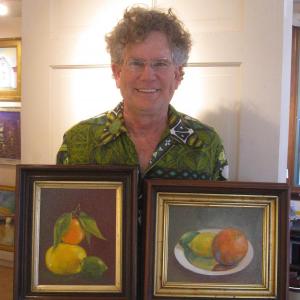 John M.T. Seitzer displays some of his new work, now on exhibit at The First bank.