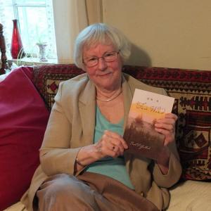 Local poet Ruth Guillard holds her most recent book, “On a Fair Wind.” Her two books can be found at Sherman's Book Store in Boothbay Harbor. RYAN LEIGHTON/Boothbay Register