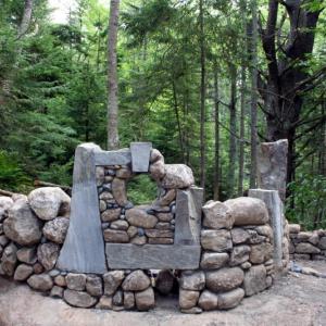 Even without its final touches in place, this stone wall by Joe Norton gives a glimpse of what's to come when the shorefront Fairy House Village reopens on August 24 at Coastal Maine Botanical Gardens. Courtesy of Barbara Freeman Even without its final touches in place, this stone wall by Joe Norton gives a glimpse of what's to come when the shorefront Fairy House Village reopens on August 24 at Coastal Maine Botanical Gardens. Courtesy of Barbara Freeman