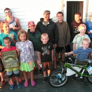 Winners and door prize recipients in the 9th Annual Boothbay Region Fish & Game Association Saltwater Fishing Tournament pose for a group photo behind young Danny Gray, who won the top Junior Division door prize of a brand-new stunt bicycle. Photo by Barry Gibson Winners and door prize recipients in the 9th Annual Boothbay Region Fish & Game Association Saltwater Fishing Tournament pose for a group photo behind young Danny Gray, who won the top Junior Division door prize of a brand-new stunt bicycle. Photo by Barry Gibson
