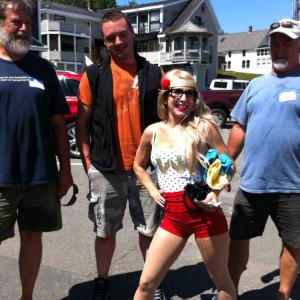 Waffle girl to the rescue! This year, Wannawaf's waffle eating contest for a cause drew its largest crowd and raised over $4,000 in support of the Scott family of Boothbay. Waffle girl, a.k.a Wannawaf owner Anya Arsenault, poses here with the top three eaters of the day. Left to right, Jon Lewis, first runner-up, Max Bare, champion, and Dave Cyco, second runner-up. Courtesy of Lizzie Lewis