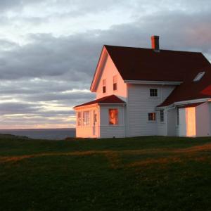 The Monhegan Museum, located on the top of a hill overlooking Monhegan Harbor and Muscongus Bay beyond.
