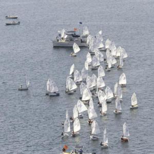 The Opti racers line up to start a race. Pilot Mark Keegan provided Nick Mace with this opportunity to photograph the races from sky. 