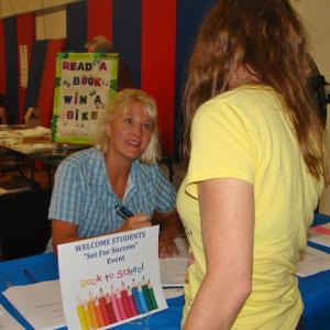 Jean Duncan signs up a customer at last year's Set for Success event. KEVIN BURNHAM/Boothbay Register