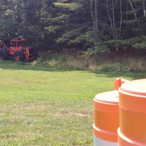 A skidder belonging to Erik Carlson of C & L Forestry is ready to get to work clearing trees for the new tennis courts being constructed on the Boothbay schools' campus. RYAN LEIGHTON/Boothbay Register