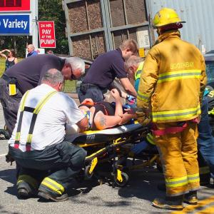Emergency personnel work to remove the driver of the Mercury station wagon. GARY DOW/Boothbay Register