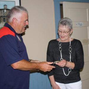 King Lion Mike Giles welcomes new member, Elizabeth McKim. Courtesy of Susie Giles