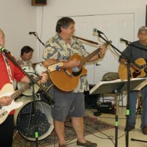 Music for the Hometown Heroes program is provided by, from left, Garry Blackman Sr., Mike Ferrucci, Tim Sprague and Bob Blackman. KEVIN BURNHAM/Boothbay Register