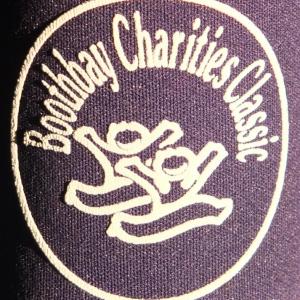 The insignia of the Boothbay Charities Classic is featured on a foam koozie. RYAN LEIGHTON/Boothbay Register