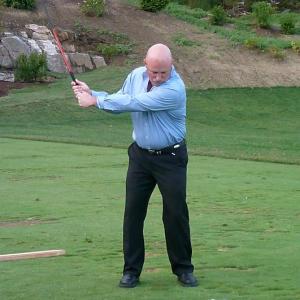 Mark Gimbel takes a swing during the “Drive the Evil Queen Away” game. KATRINA CLARK/Boothbay Register