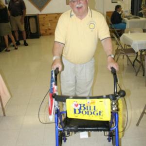 Rotarian Bill Dodge arrives at the Hometown Heroes event with his “personalized” walker. KEVIN BURNHAM/Boothbay Register