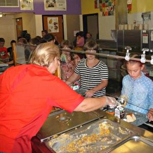 Third and fourth grade students line up to receive heaping spoonfuls of homemade shepherd’s pie from Dawn Sutter for lunch at Boothbay Region Elementary School. KATRINA CLARK/Boothbay Register Third and fourth grade students line up to receive heaping spoonfuls of homemade shepherd’s pie from Dawn Sutter for lunch at Boothbay Region Elementary School. KATRINA CLARK/Boothbay Register