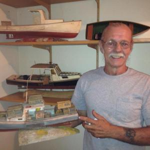 WOOLWICH RESIDENT Dana McLean has been building model (or shrunken) wooden lobster boats since 1993. It's all in the detail. LISA KRISTOFF/Boothbay Register 