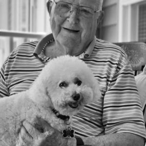 St. Andrews Village resident Don Walker’s Bichon Mandy not only makes sure he gets plenty of exercise, she brightens his day and facilitates many conversations on their walks. Courtesy of Alan Crowell St. Andrews Village resident Don Walker’s Bichon Mandy not only makes sure he gets plenty of exercise, she brightens his day and facilitates many conversations on their walks. Courtesy of Alan Crowell