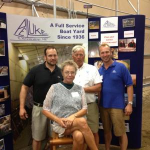 East Boothbay’s Paul E. Luke boatyard hosts Boothbay Region Chamber of Commerce Business After Hours event. In this photo Nora Luke, seated, is surrounded by her sons Keith, left, and Andy, right, and her husband Frank Luke.   