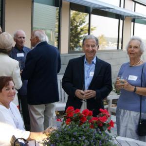 Lyn Lerner, seated at left, Dan Lerner, middle, and Helen Norton, right, enjoy the new patio at the reception for board members of the Coastal Maine Botanical Gardens and Bigelow Laboratory. Courtesy of Fran Scannell, Bigelow Lab