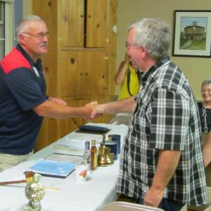 King Lion Mike Giles, left, presents Lion Tom Nickerson with the Lions Club Membership Key Award. Courtesy of John Platt King Lion Mike Giles, left, presents Lion Tom Nickerson with the Lions Club Membership Key Award. Courtesy of John Platt